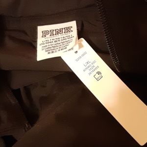 Pink brand jacket. New with tags. Size l/xl